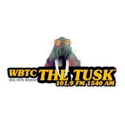 The Tusk 101.9 FM 1540 AM logo