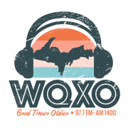 WQXO 1400 & 97.7 logo